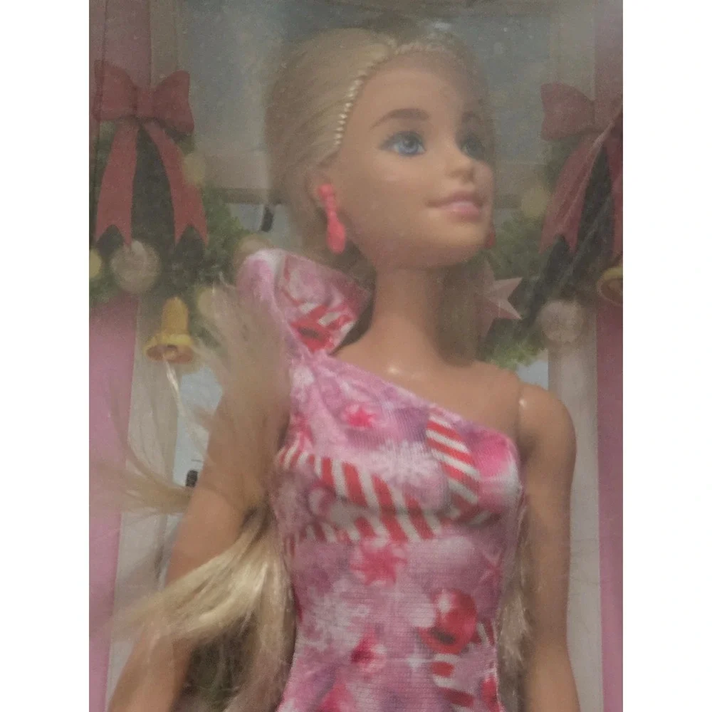 Barbie unwrap magic